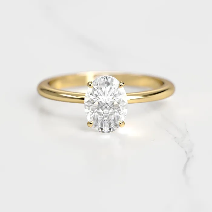 Capucinne Rings Oval Tapered Solitaire Diamond Ring