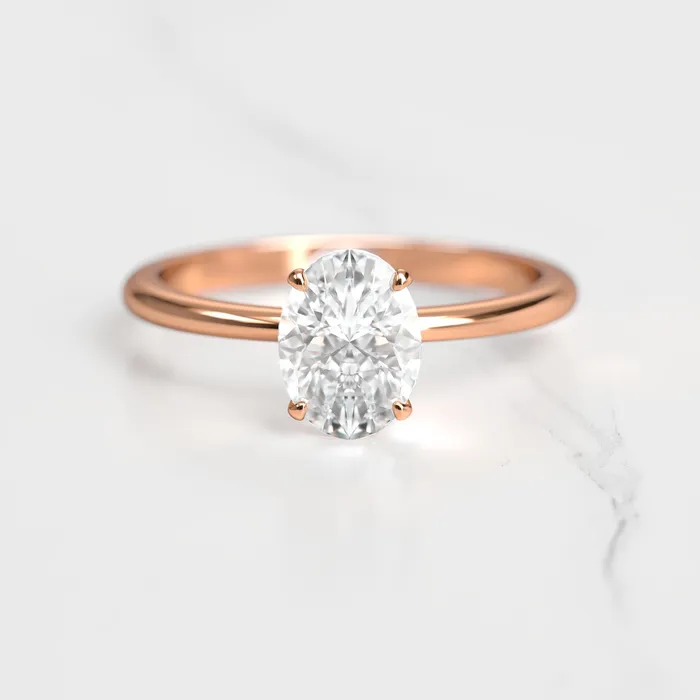 Capucinne Rings Oval Tapered Solitaire Diamond Ring