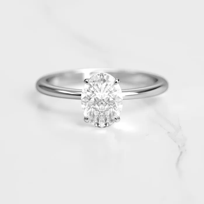 Capucinne Rings Oval Tapered Solitaire Diamond Ring